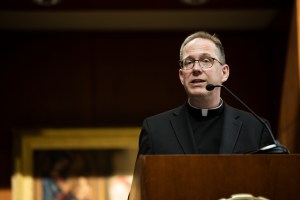 The law school's Initiative on Restorative Justice and Healing (IRJH) hosts the panel conversation Justice and Healing for a Wounded Community on May 17, 2022, at the School of Law Schulze Grand Atrium in Minneapolis. Pictured: Fr. Daniel Griffith, Founding Director of the Initiative on Restorative Justice